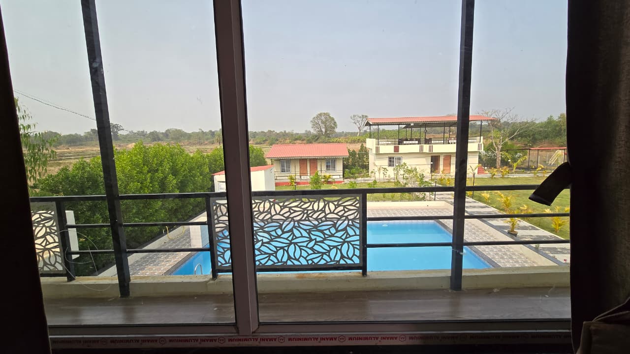 Panoramic Pool View from Villa Balcony